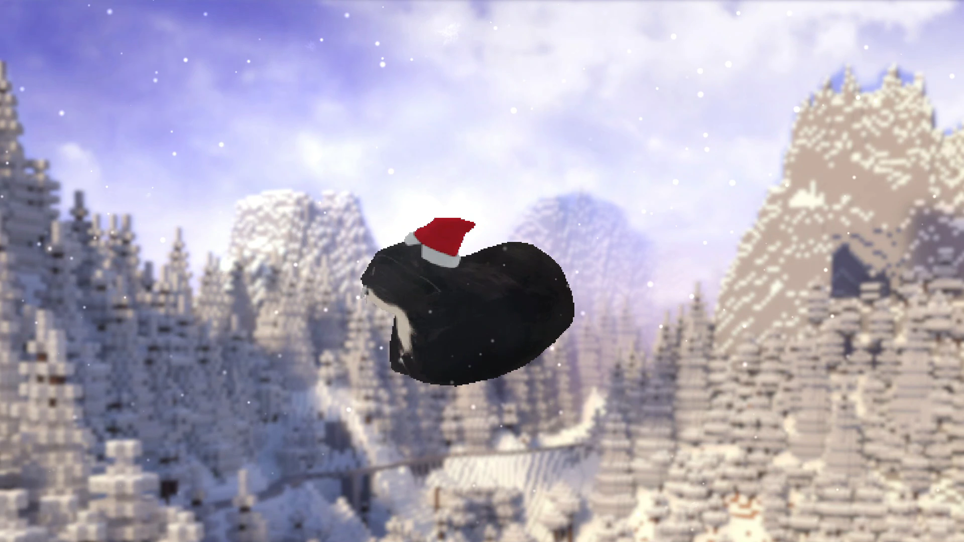 Chat de Noël au-dessus de montagnes enneigées